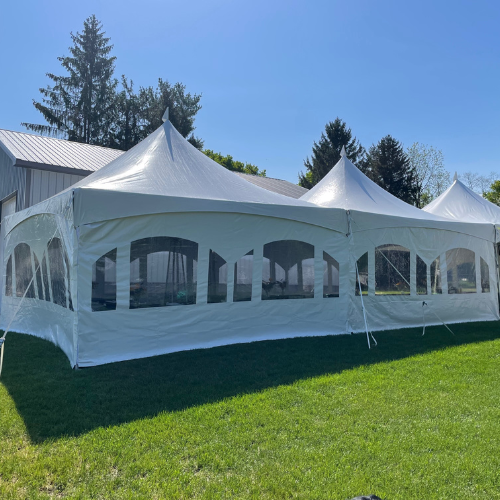 White tents outside of Boyne Co-Op Hardware and Rental