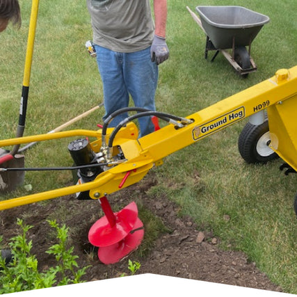 DIY RentalsLandscaper digging a hole with an auger